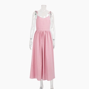 Elegant pink V-neck cotton midi dress with thin spaghetti straps and a pleated waistline