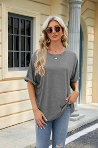 Close-up of gray loose fit T-shirt with rolled sleeves and classic crew neckline