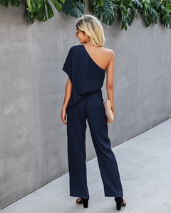 Detail view of the elegant navy one-shoulder wide-leg jumpsuit with an open-back design
