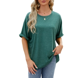 Relaxed fit dark green crew neck t-shirt with rolled sleeves for women shown on model