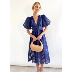 Navy blue V-neck midi dress with lantern sleeves and button-down waist detail