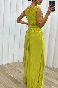 Detail of lime green pleated sleeveless maxi dress featuring back waist gathering and hidden zipper
