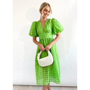 Green lantern sleeve dress with textured fabric and V-neckline in summer style