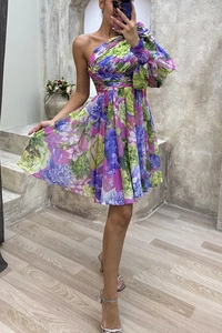 Detail of floral one-shoulder mini dress with lantern sleeves and cinched waist