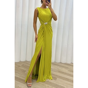 Sleeveless pleated maxi dress in bright lime green with rhinestone buckle and high slit