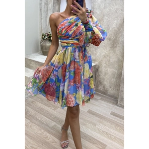 Floral off-shoulder mini dress with one long puff sleeve and vibrant blue abstract print