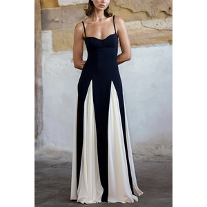 Elegant black and white color block maxi dress with pleated skirt and thin straps