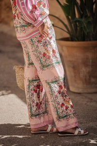 Floral print two-piece set featuring long-sleeved shirt and wide-leg trousers for vacation