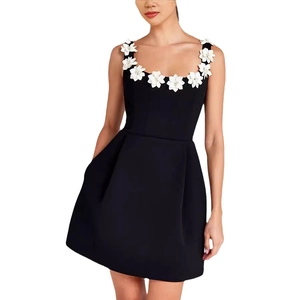 Loose black sleeveless A-line dress with white 3D flower appliqués on straps