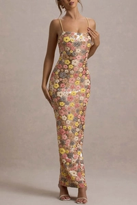 Detailed close-up of floral sequin embroidery on a slim-fit evening strap dress