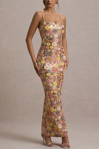 Close-up of intricate floral sequins on a slim-fit spaghetti strap party dress