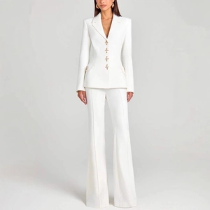Three-piece women's white suit with long sleeve blazer, vest, and flared pants set