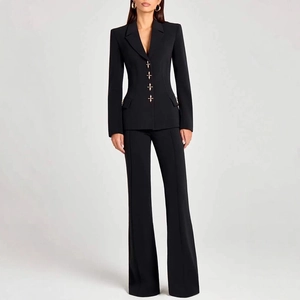 Women's chic black suit set with gold cross buttons and high waisted flare pants