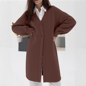 Brown oversized long knit cardigan sweater with buttons for women in minimalist style