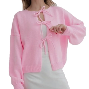 Pink knit cardigan with front bow-tie closure and dropped shoulder sleeves for women