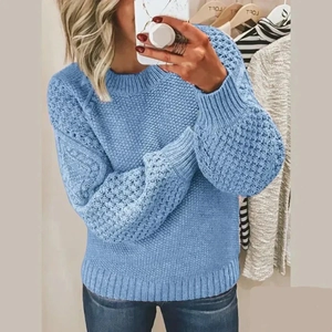 Sky blue crewneck knit sweater with popcorn texture lantern sleeves in a casual fit