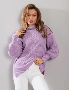 Detail of lavender high neck knit sweater with ribbed cuffs and lantern sleeve texture