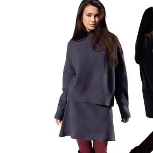 Women's two-piece dark grey knit set with loose sweater and matching mini skirt