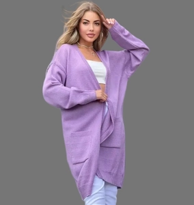Detail of lavender knit cardigan featuring large side pockets and ribbed cuffs texture