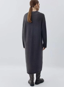 Detailed back view of a dark grey knitted maxi dress with elegant long sleeve design
