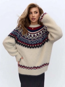 Close-up of Fair Isle knit sweater with nordic jacquard patterns and fuzzy texture