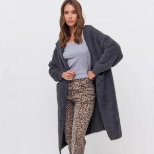 Close-up of charcoal grey fuzzy knit cardigan featuring oversized patch pockets and plush texture