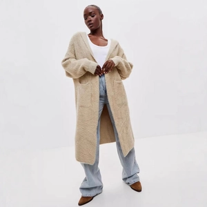 Detailed knit texture of oversized hooded long cardigan in plush faux mink fur