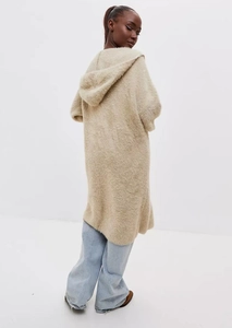 Back view of a long beige faux mink fur cardigan with hood and cozy oversized fit