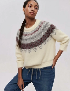 Close-up of Fair Isle geometric knit pattern on soft mohair texture sweater