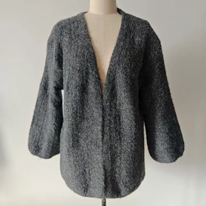Mid-grey knit cardigan with lantern sleeves and soft mohair texture in loose fit