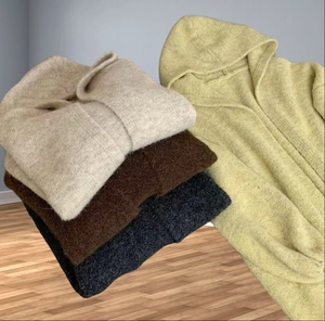 Detailed view of soft mohair knit textures in cream brown grey and green colors