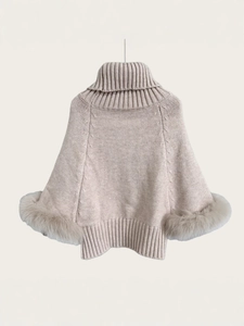 Beige cable-knit turtleneck poncho sweater with fluffy fox fur cuffs for women