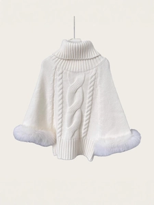 White high-neck knit poncho sweater with cable knit patterns and fox fur cuffs