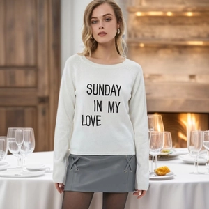 Detail of Sunday In My Love letter print on white crewneck long sleeve knit sweater