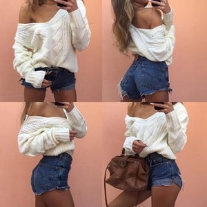 Close-up of white cable knit pattern on off-shoulder long sleeve sweater for women