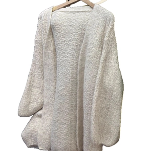 Cream knit cardigan with puff sleeves and oversized loose fit for women