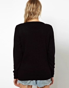 Back view of a black long-sleeve knit sweater with a classic crew neck for women