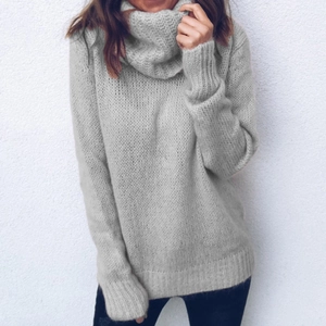 Oversized light grey turtleneck sweater for women with ribbed hem and thick knit texture