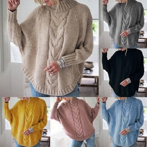 Détails du motif torsadé sur ce pull oversize à manches chauve-souris pour femmes