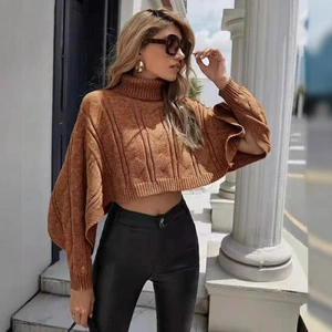 Women's camel cable knit high neck poncho sweater with batwing sleeves and textured pattern