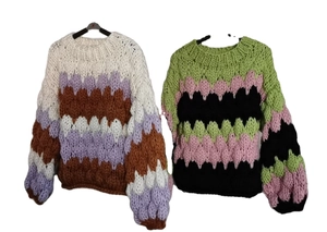Handmade chunky knit oversized sweater in colorful patchwork wool with lantern sleeves