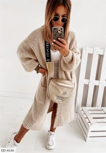 Cozy oatmeal beige long knit cardigan with side pockets and textured loose fit design
