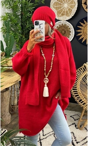 Detailed view of women's red three-piece knit set including sweater, scarf and beanie hat