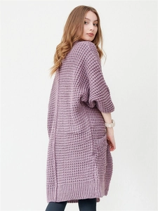 Detail view of mauve chunky waffle knit cardigan with large side pocket and rib-knit cuffs