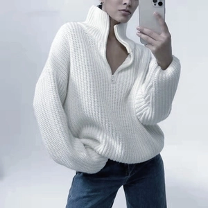 Chic white knit oversized sweater with high neck zipper and ribbed texture