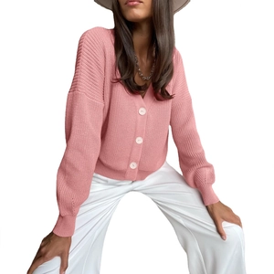 Pink chunky knit V-neck cardigan with white buttons and drop shoulder casual design