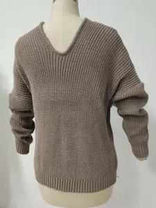Detailed back view of a khaki V-neck knit sweater featuring drop shoulder and ribbed edges
