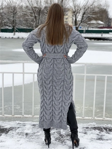 Detail of grey cable-knit texture and fabric quality on women long cardigan with belt