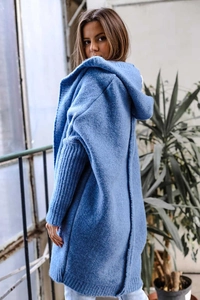 Detail of blue long-sleeve hooded knit sweater with textured thick wool stitching