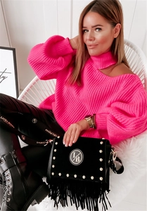 Detailed texture of neon pink hollow-out knit sweater and black fringe crossbody bag
